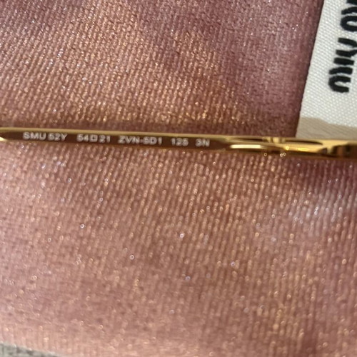 Miu Miu SMU52Y sunglasses like new, multicolor metal frame