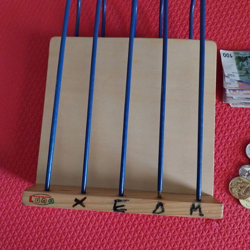 Luna abacus and used learning coins
