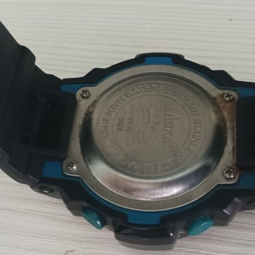 Electronic wristwatch used, battery replacement needed