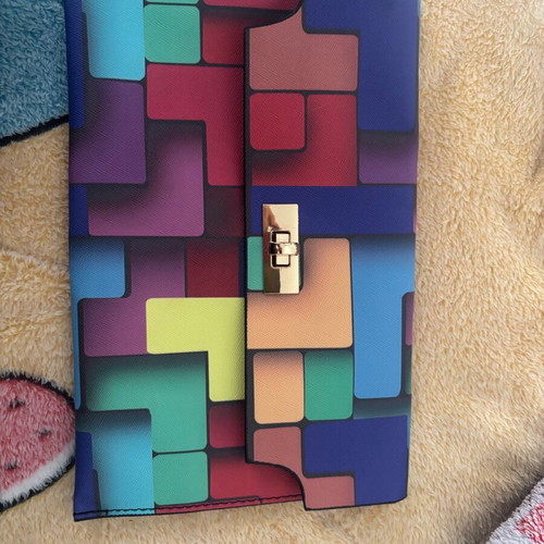 Colorful leather handheld clutch like new