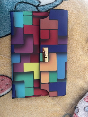 Colorful leather handheld clutch like new