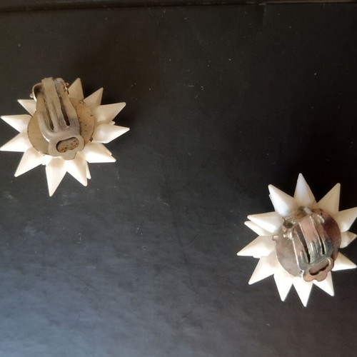 Vintage white clip-on earrings used from the 1960s