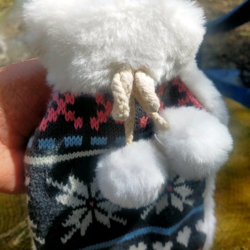 Winter hat used with fluffy pom-poms