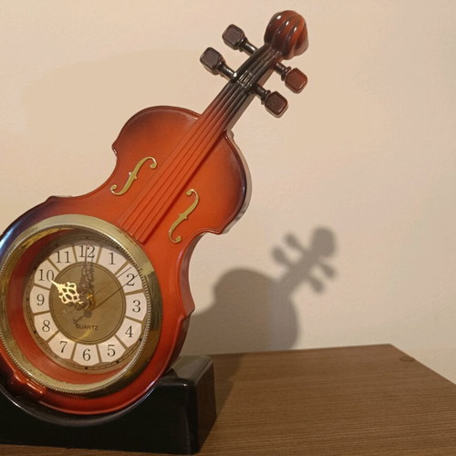 Quartz table clock in violin shape like new
