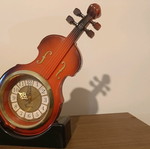 Quartz table clock in violin shape like new