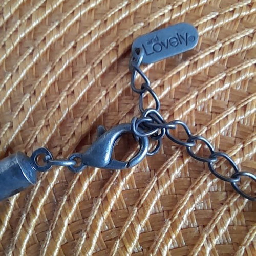 Necklace silver like new with black textile laces