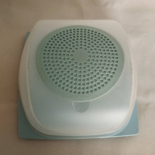 Tupperware cheese container used