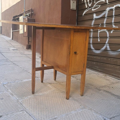 Dining table used with 2 drop-leaves and cabinet with shelf