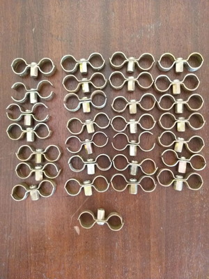 Double copper pipe clamps 18 mm like new, pack of 29 pieces