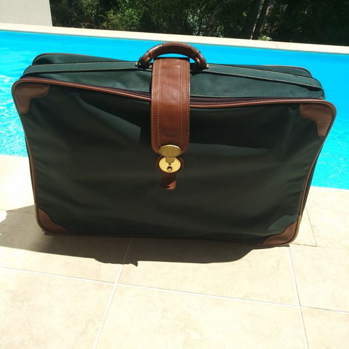 Vintage suitcase from France used with luxury waterproof fabric and leather