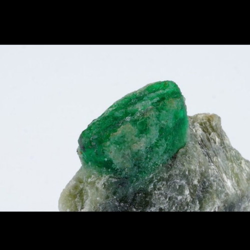 Emerald mineral in rock new with deep green color