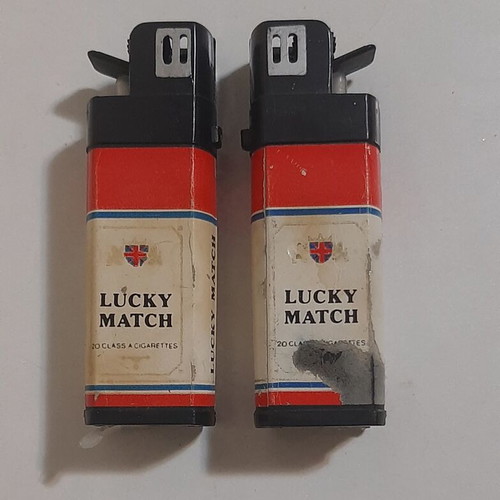 Vintage 80s squirting lighter set of 2 used prank toys
