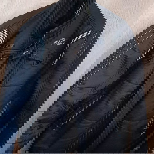 Μπουφάν Tresor medium μεταχειρισμένο, μαύρο με αντανακλαστικές γραμμές