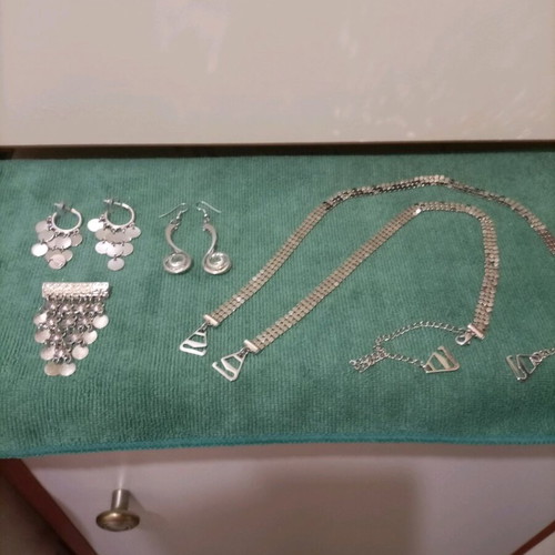 Stainless steel earrings, pin and straps like new, silver color