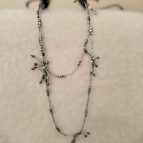 Long necklace like new with metallic beads gray silver