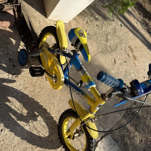 Kids BMX bike used, blue and yellow with snake design