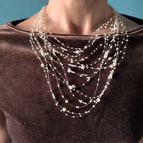 Accessorize white faux bijoux necklace used with white beads
