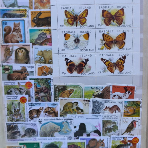 Album A4 16 pages like new with multinational animal stamp collection