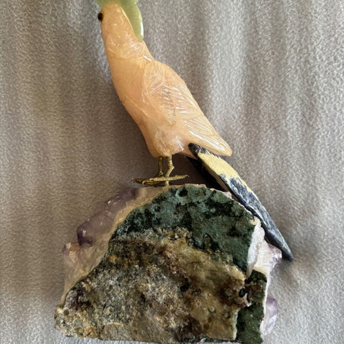 Decorative quartz parrot on raw amethyst base like new