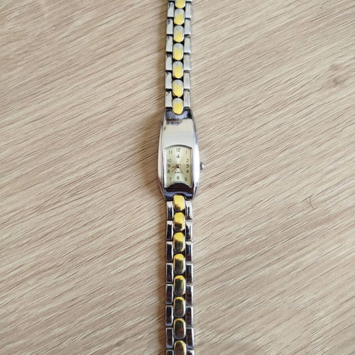 SK women's watch used, silver and gold colors