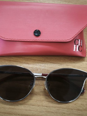 Carolina Herrera sunglasses new with red arms
