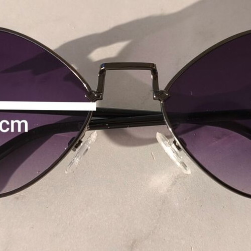 Sunglasses with purple lenses like new, black