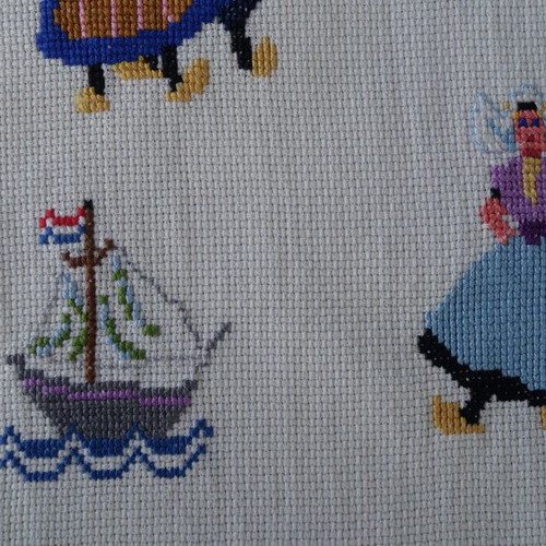 Embroidery with traditional costumes and Dutch scenes like new