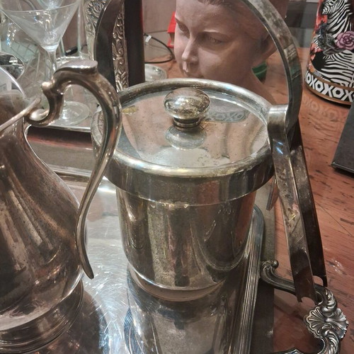 Silver-plated utensils used, set with Christofle tray and Lampidis jug