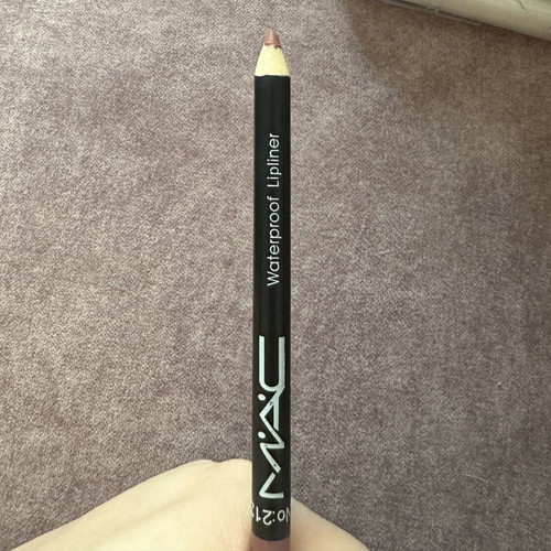Wet and Wild eyeshadow palette and assorted lip products