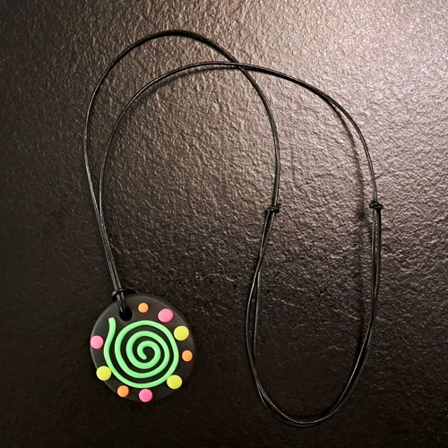 Handmade fluo pendant with spiral design like new