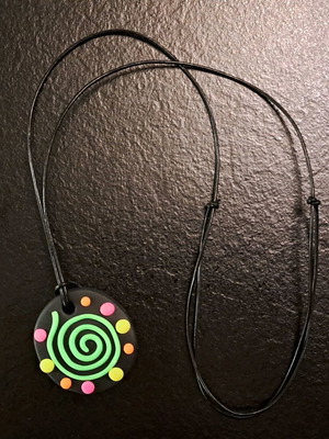 Handmade fluo pendant with spiral design like new