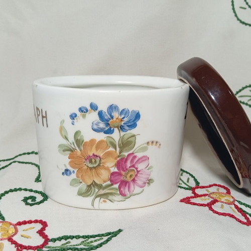 Vintage ceramic sugar container used with floral design and brown lid