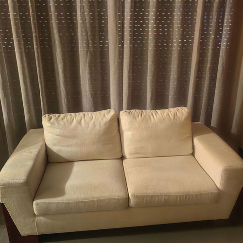 Two-seater sofa used, made of solid wood