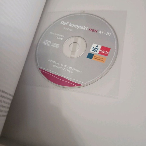Three German language learning books like new with CD