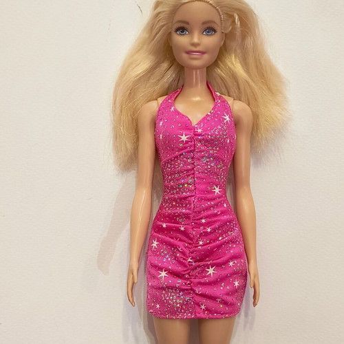 Barbie doll with dress like new