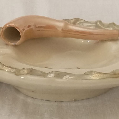 Handmade Art Deco ashtray used from the 1950s with inset pipe