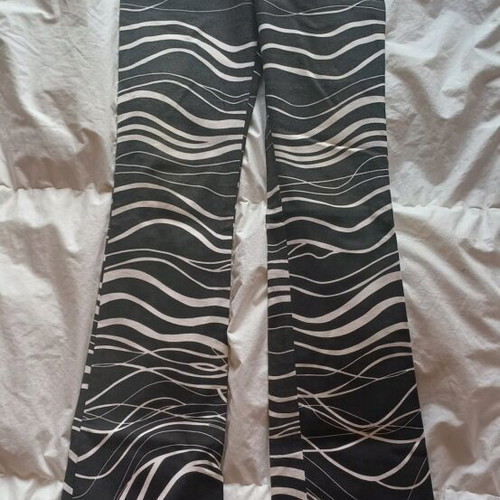 Guess women's animal print zebra pants used, size medium