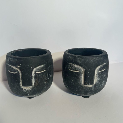 Pot Head clay pots set of 2 like new, black with stylized faces