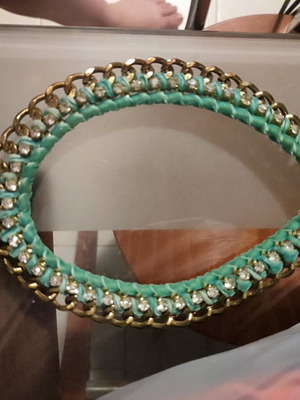Necklace used with turquoise velvet ribbon and gold chain
