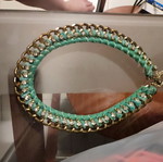 Necklace used with turquoise velvet ribbon and gold chain
