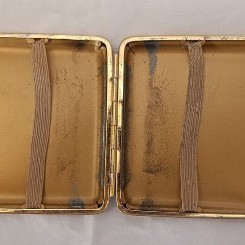 Classic cigarette case used, black leatherette with bronze interior