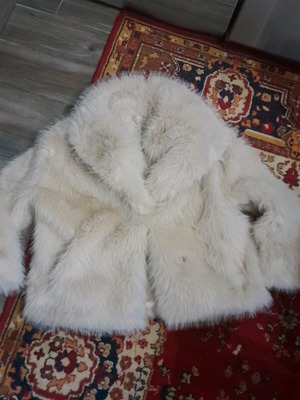 Fur coat size large like new, worn twice