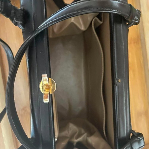 Vintage black patent leather handbag with gold wing clasp like new