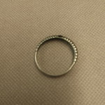 Silver ring with embossed ribbed design used
