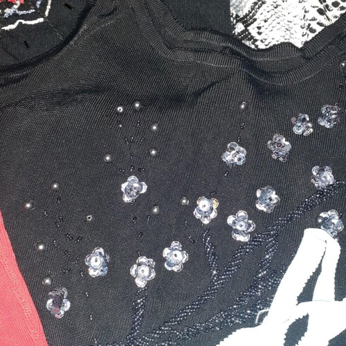 Box skirts and tops size small like new, black and colorful