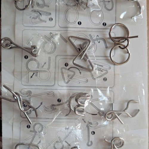 Metal Magic Schmidt set with 12 metal puzzles