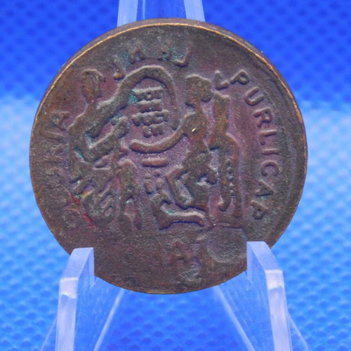 Decorative bronze medal with relief design