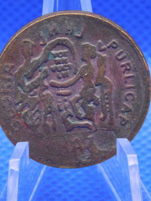 Decorative bronze medal with relief design