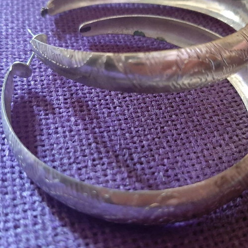 Earrings used large hoops