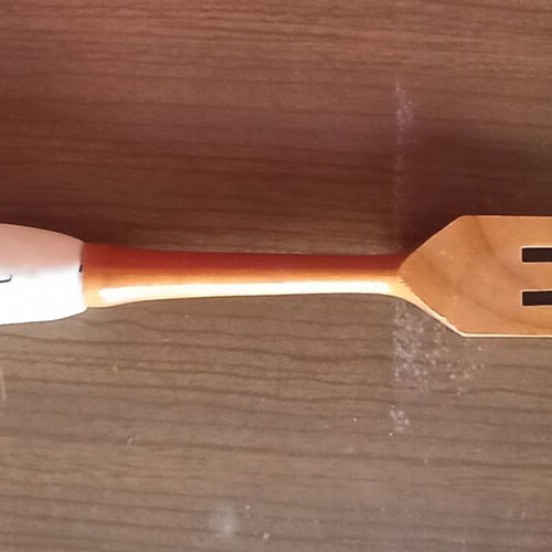 Kitchen set used with molds, cooking cups, wooden fork and sieve